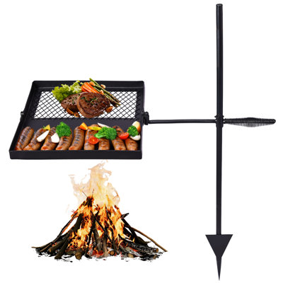 Grille de cuisson portative pliante et pivotante au-dessus d'un foyer