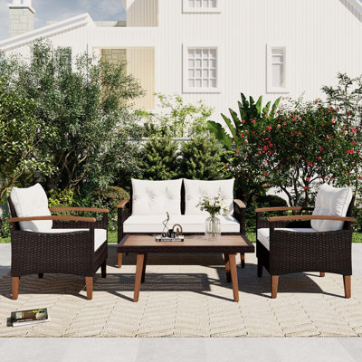 Aadyanth Acacia Wicker 4 - Person Patio Conversation Set with Cushions