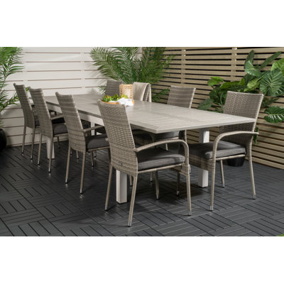 Jayesh 8 - Person Patio Dining Set with Extendable Rectangular Table , Cushions Included
