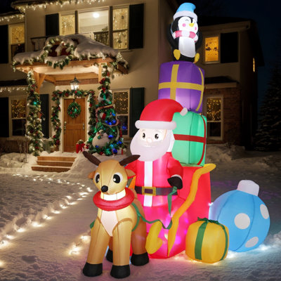 Inflatable Santa Claus On Sleigh With Reindeer And Penguin – 5.9 Feet Long With LED Lights