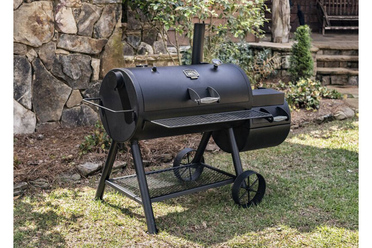 barrel smoker in sunny yard