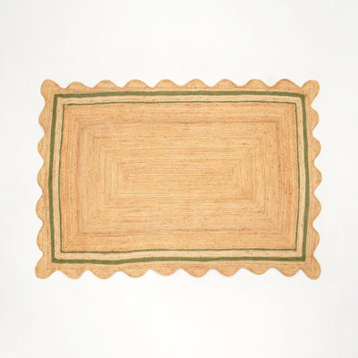Tapis en jute naturel avec bords festonnés et bordure