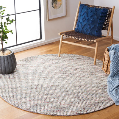 Tapis gris en laine tissé à la main