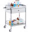 Chariot utilitaire médical en acier inoxydable avec rangement à deux niveaux, tiroir intégré, capacité de 220 lb et roulettes verrouillables silencieuses à 360 ° pour le laboratoire, la clinique, la cuisine ou le salon.