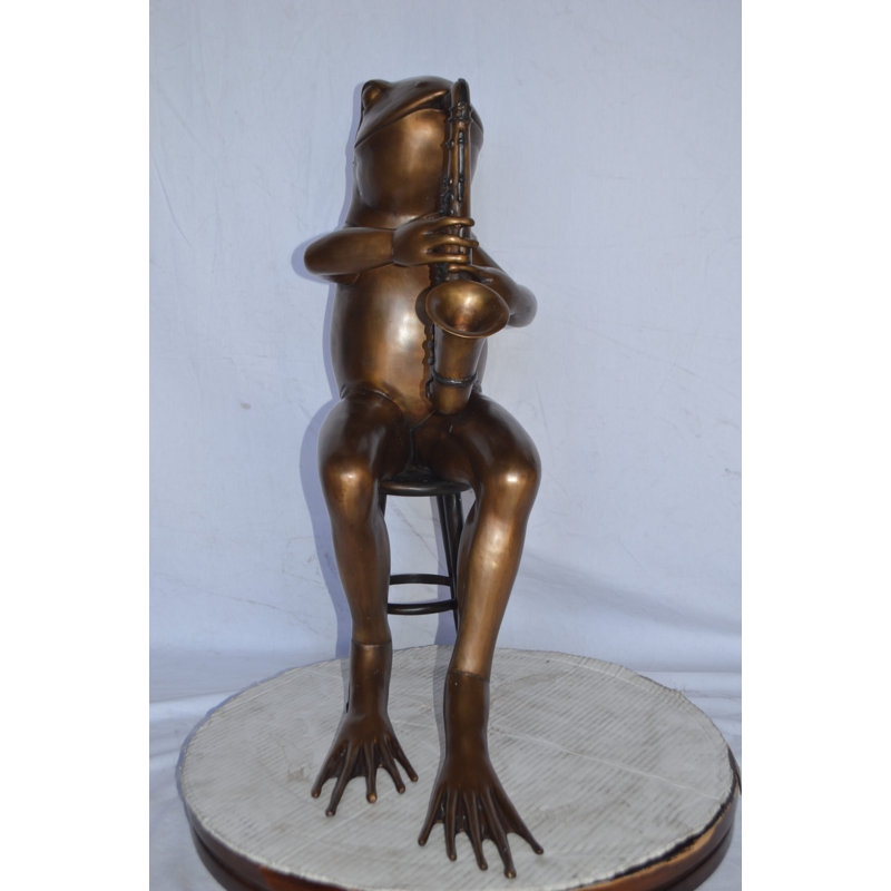 Frog playing saxophone bronze statue - Size: 23"L x 15"W x 30"H.