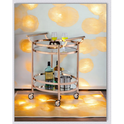 Chariot de service Lakelyn en verre transparent et or rose avec tablettes trempées et miroirs, idéal pour les réceptions élégantes et la décoration intérieure.