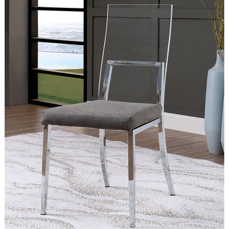 2 chaises de salle à manger en acrylique et rembourrées, composition en métal avec pieds transparents