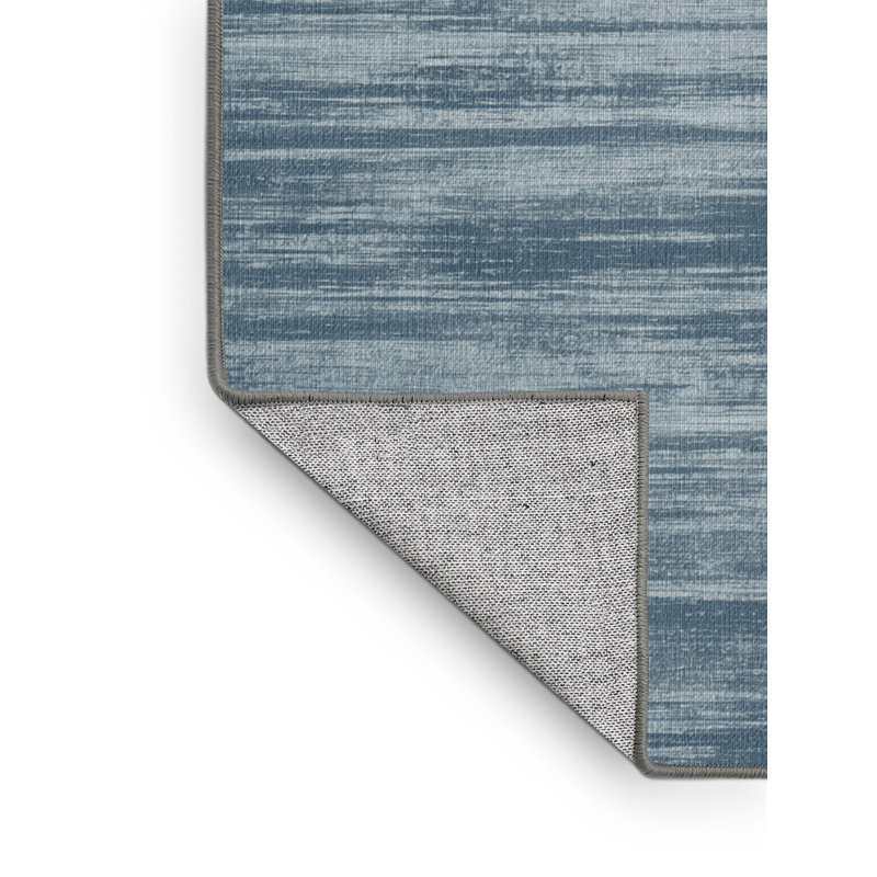 Tapis gris uni lavable à la machine