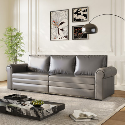 Canapé-lit Chesterfield 3 en 1 en similicuir convertible avec garniture cloutée, accoudoirs roulés et très grand lit gigogne escamotable pour des espaces de vie polyvalents
