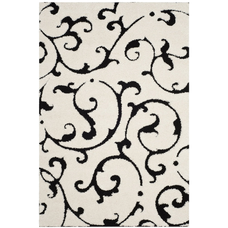 Tapis floral en polypropylène tissé à la machine Tess en ivoire / noir, Rectangle 3 pi 3 po x 5 pi 3 po