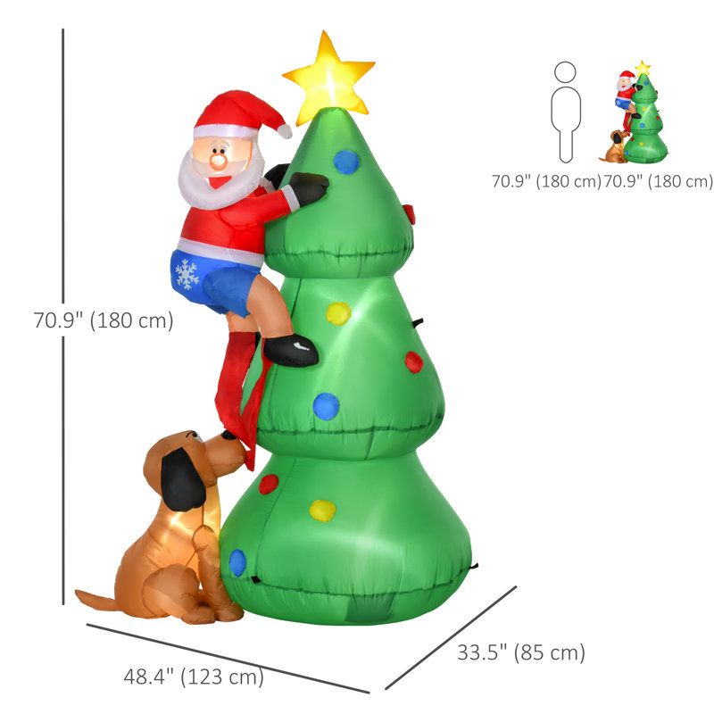 Arbre de Noël avec chien de père Noël gonflable