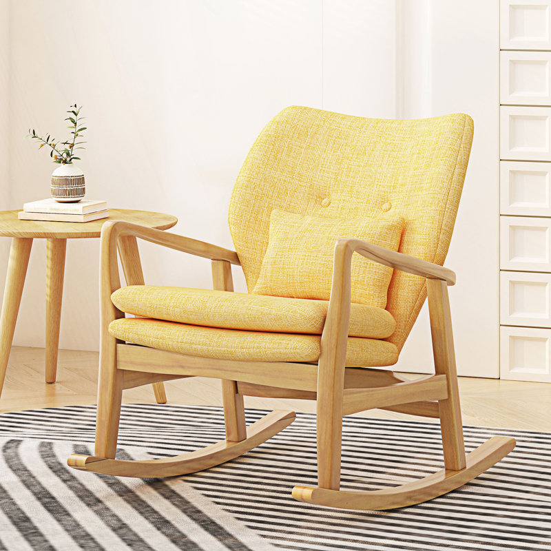 Chaise berçante élégante avec coussin