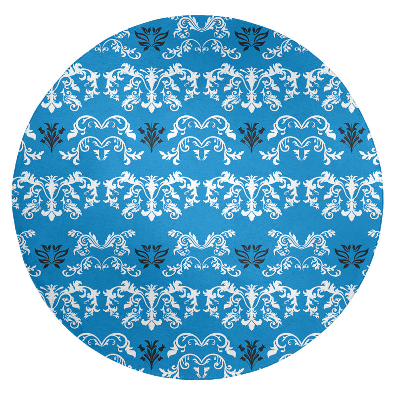 Tapis rond bleu damassé à motif baroque