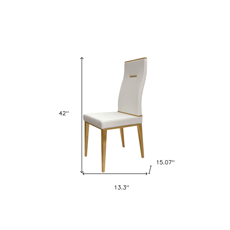 Ensemble de quatre chaises d'appoint de salle à manger rembourrées en similicuir blanc et or