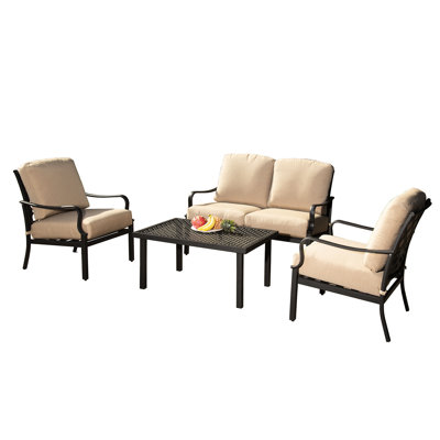 Conversation de patio de style rétro - structure en métal et coussins beiges pour le plaisir avec des chaises de table Une expérience extérieure relaxante
