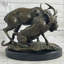 Sculpture de lion et de cerf Brewen