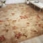 Tapis brun et rouge à motif floral Asifa-16762181