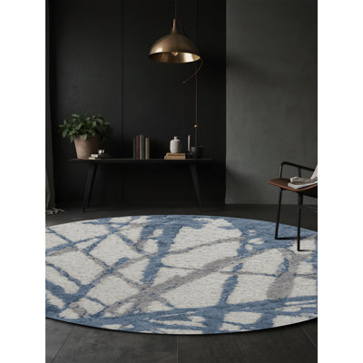 Tapis gris soyeux et moelleux