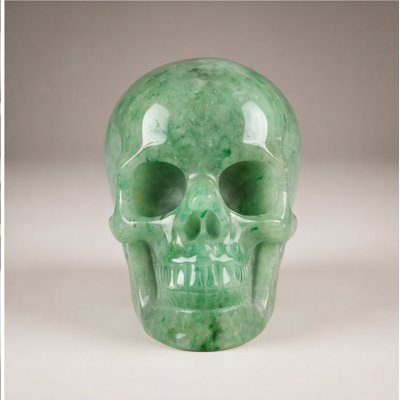 Sculpture crâne de cristal aventurine vert taillé à la main pierre naturelle style 14