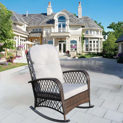 Chaise berçante d'extérieur en osier avec assise large, coussin épais et moelleux, chaise berçante en rotin avec structure en acier, capacité de poids élevée pour le patio, le jardin, la cour arrière, le coussin