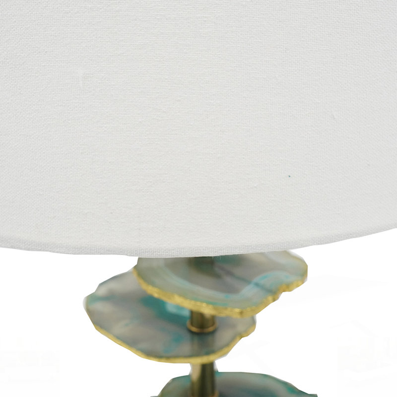 Lampe de table avec base en marbre élégante, parfaite pour ajouter une touche de luxe et de beauté naturelle à n'importe quelle pièce