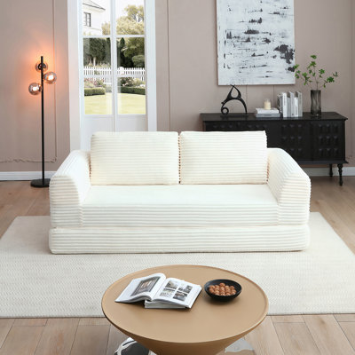 Canapé-lit pliant convertible 2-en-1 avec revêtement en velours côtelé et fonction de couchage coulissante pour les espaces de vie modernes.