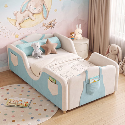 Overalls-Inspired Upholstered Toddler Bed with 6 Storage Pockets, Crib Size Kids Bed with Soft Padded Guardrails, Low Profile Transition Bed for Boys & Girls, 4 Colors Available