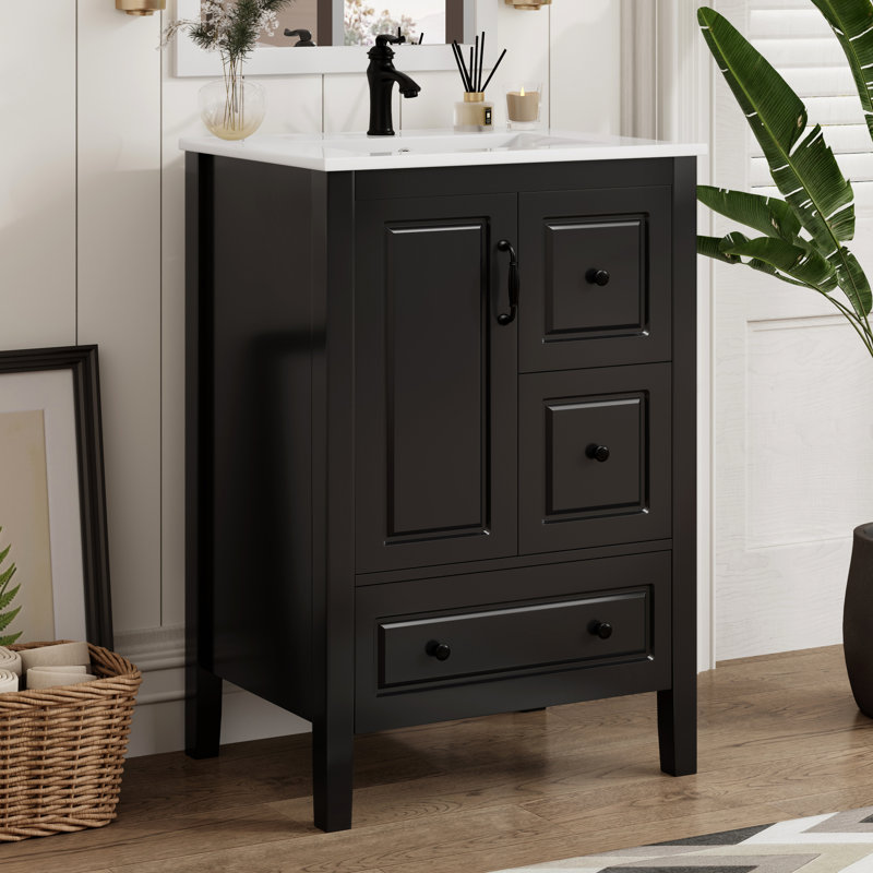 Meuble-lavabo autoportant noir de 24 po avec lavabo en céramique lisse, une porte à fermeture douce et 3 tiroirs pour articles de salle de bain