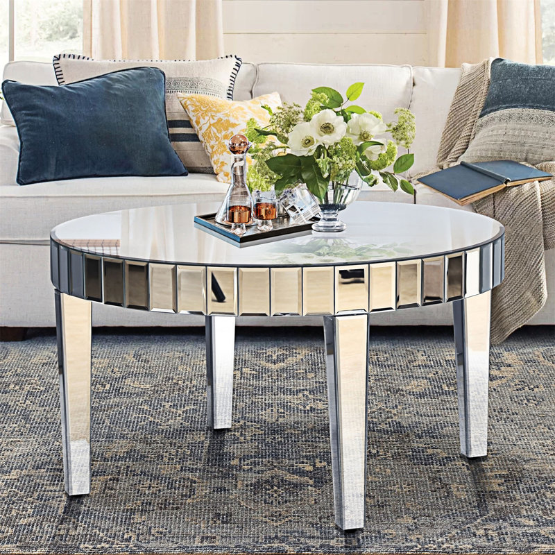 Table de salle à manger ronde avec miroir en forme d'étoile