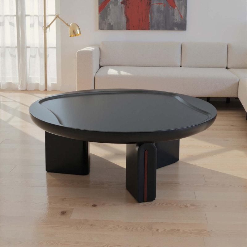 Table basse ronde moderne, en MDF brillant avec plateau concave et piètement à 3 pieds