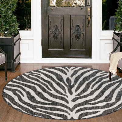 Phocas Animal Print Indoor / Outdoor Area Rug in White