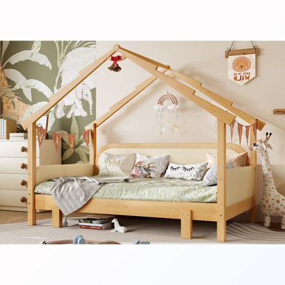 Lit simple en bois avec coussin
