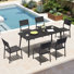 Ensemble repas pour 6 personnes avec table ovale et trou pour parasol