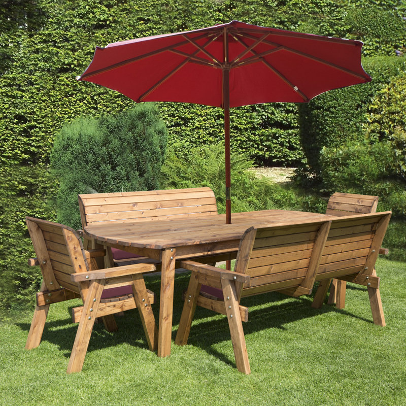 Fischer 8 - Person Wood Patio Dining Set with Rectangular Table , Cushions Included, Burgundy