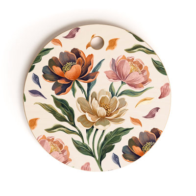 Planche à découper ronde Marta Barragan Camarasa, peinte à la main, avec un motif de pivoines.