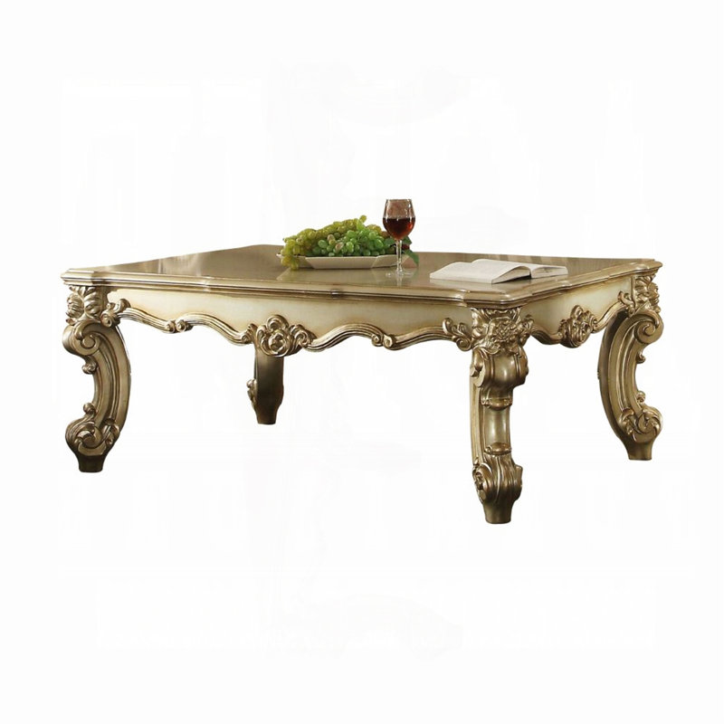 Table basse avec pieds à volutes, Or