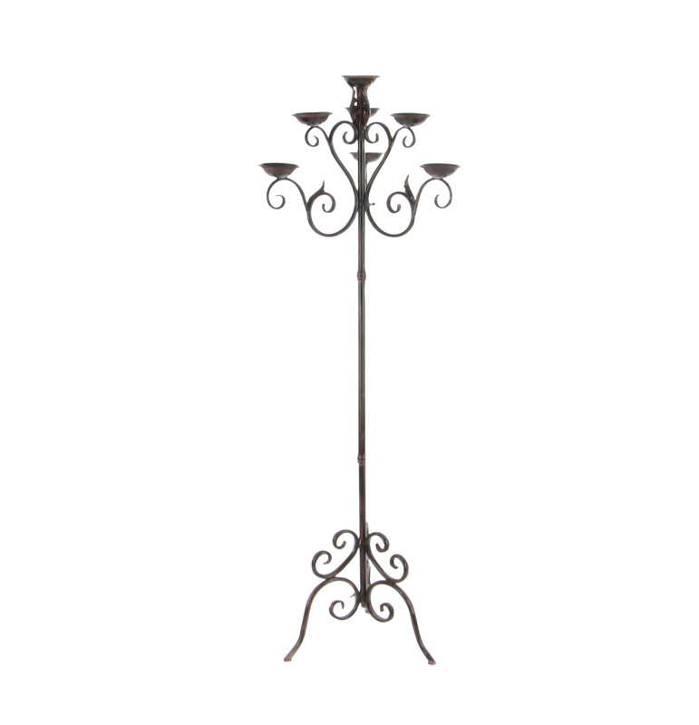 Grand candélabre brun en métal avec motifs à volutes