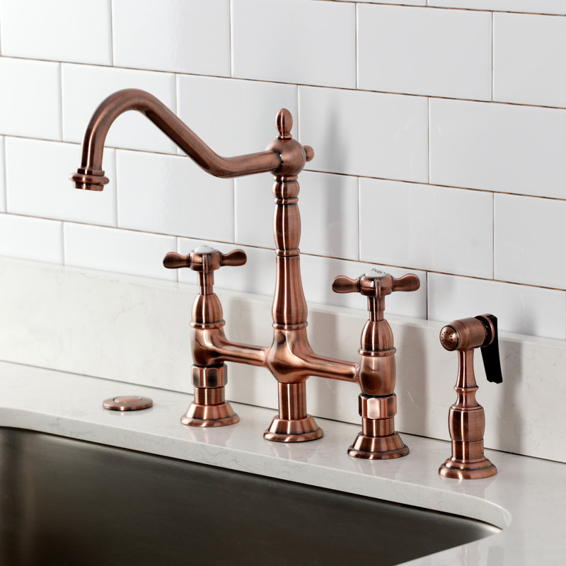 Kingston Brass Bel-Air Two-Handle 4-Hole Deck Mount Bridge Kitchen Faucet with Brass Side Sprayer, Cross, Antique Copper