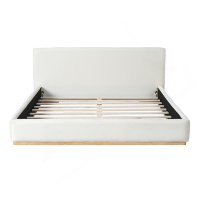 Élégant lit rembourré avec structure en bois, libérant une nouvelle expérience de sommeil confortable, grand, blanc