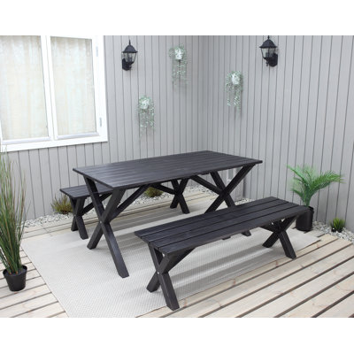 Edgerton 4 - Person Solid Wood Patio Dining Set Rectangular Table