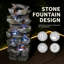 Fontaine à cascade en résine avec éclairage DEL intégré, composée de pierres empilées à plusieurs niveaux, idéale pour décorer terrasse, pelouse, jardin ou cour.