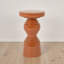 Table d'appoint piédestal en métal terre cuite
