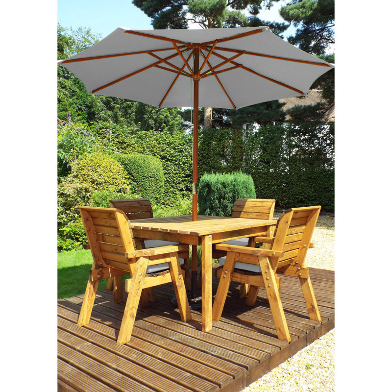 Felder 4 - Person Solid Wood Patio Dining Set Umbrella Hole Included Square Table with Cushions Included, Grey