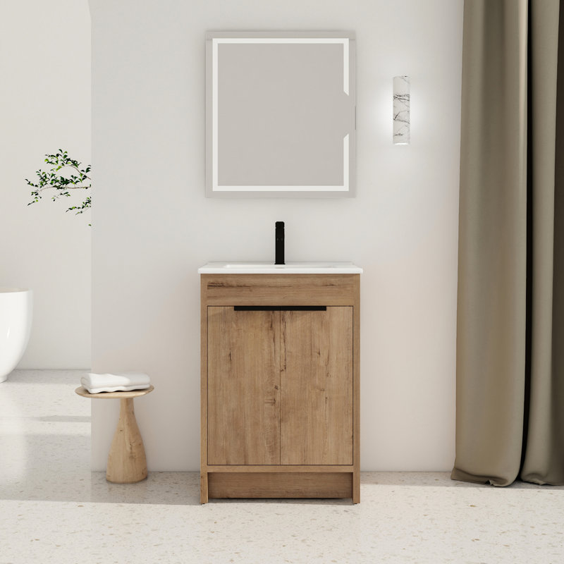 Meuble-lavabo autoportant pour salle de bain. 24 po de long. Lavabo en céramique. 2 portes à fermeture en douceur. Contreplaqué. Moderne avec lavabo. Autoportant. Unité