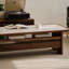 Table basse beige en pierre et bois de noyer