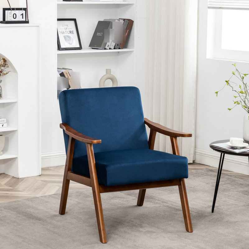 Le fauteuil d'appoint en velours bleu foncé avec structure en bois massif stable, pour le salon, la chambre à coucher et le cadre de l'entrée recouvert de velours profond, ajoute une touche de classe aux pièces