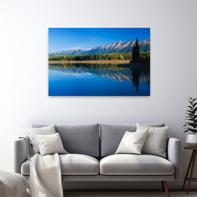 Swan Mountain Range Reflecting In Calm Water Of Rainy Lake Seeley Swan Valley Montana Usa. Tranquil Abstract Contemporary Pine Forest Landscape Art