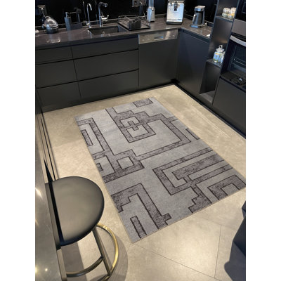 Tapis décoratif moderne à motif géométrique abstrait gris