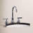 Kingston Brass Manhattan Two-Handle 3-Hole Deck Mount Widespread Bathroom Faucet with Brass Pop-Up Drain-45639301