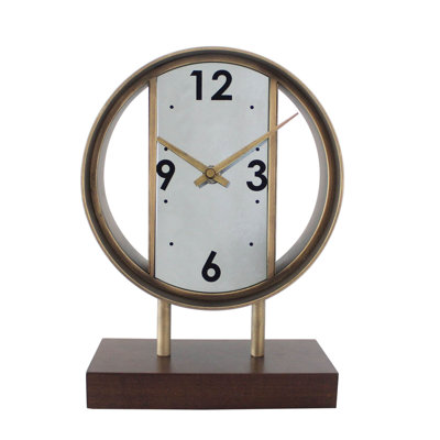 Modern and stylish, the Levi features an easy to read Arabic dial and quartz time only movement.  The wrought iron case stands on a wooden base.